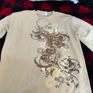 This is a small khaki long sleeve, it’s in great condition!